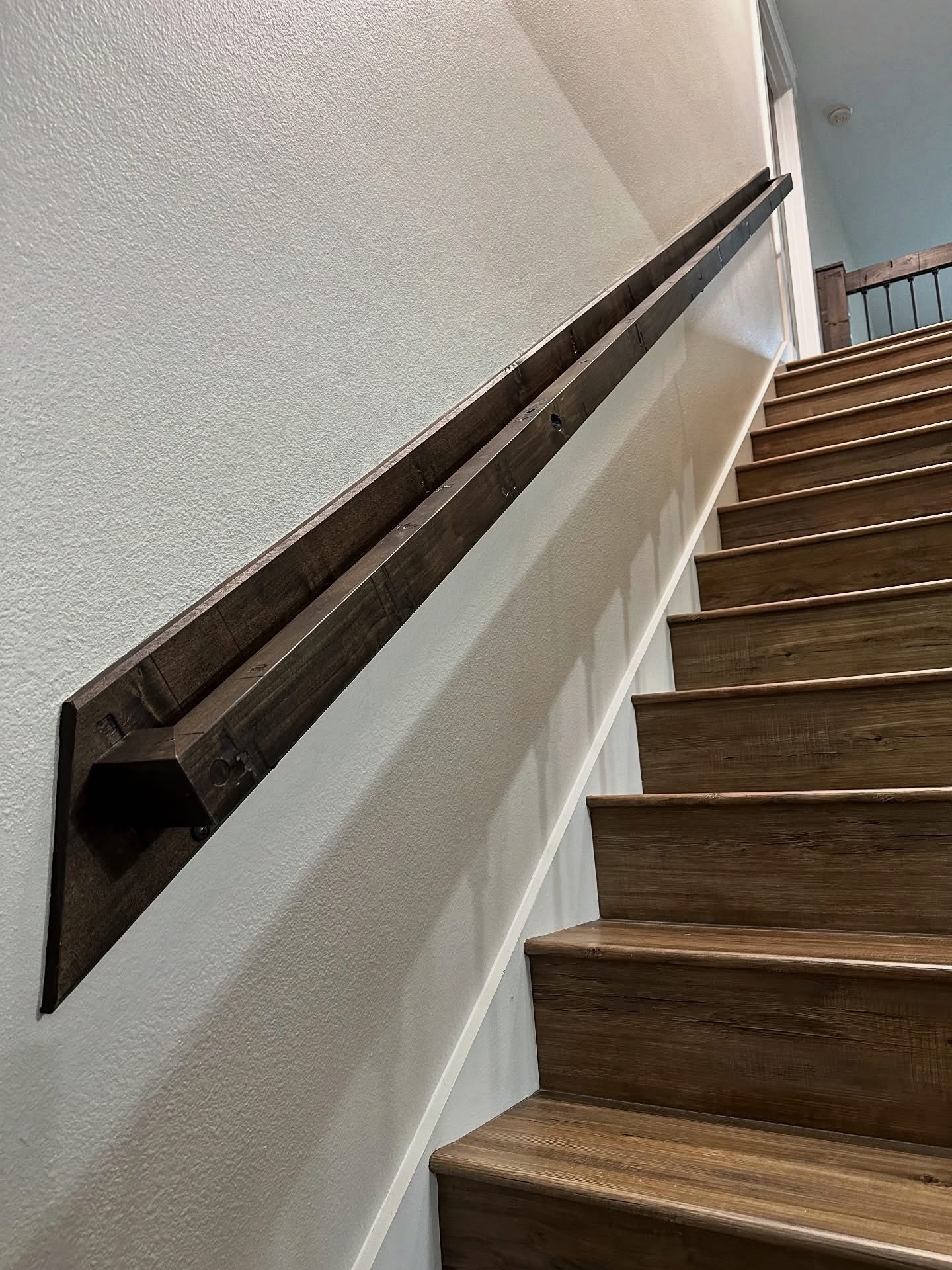 Custom reclaimed wood stair railing